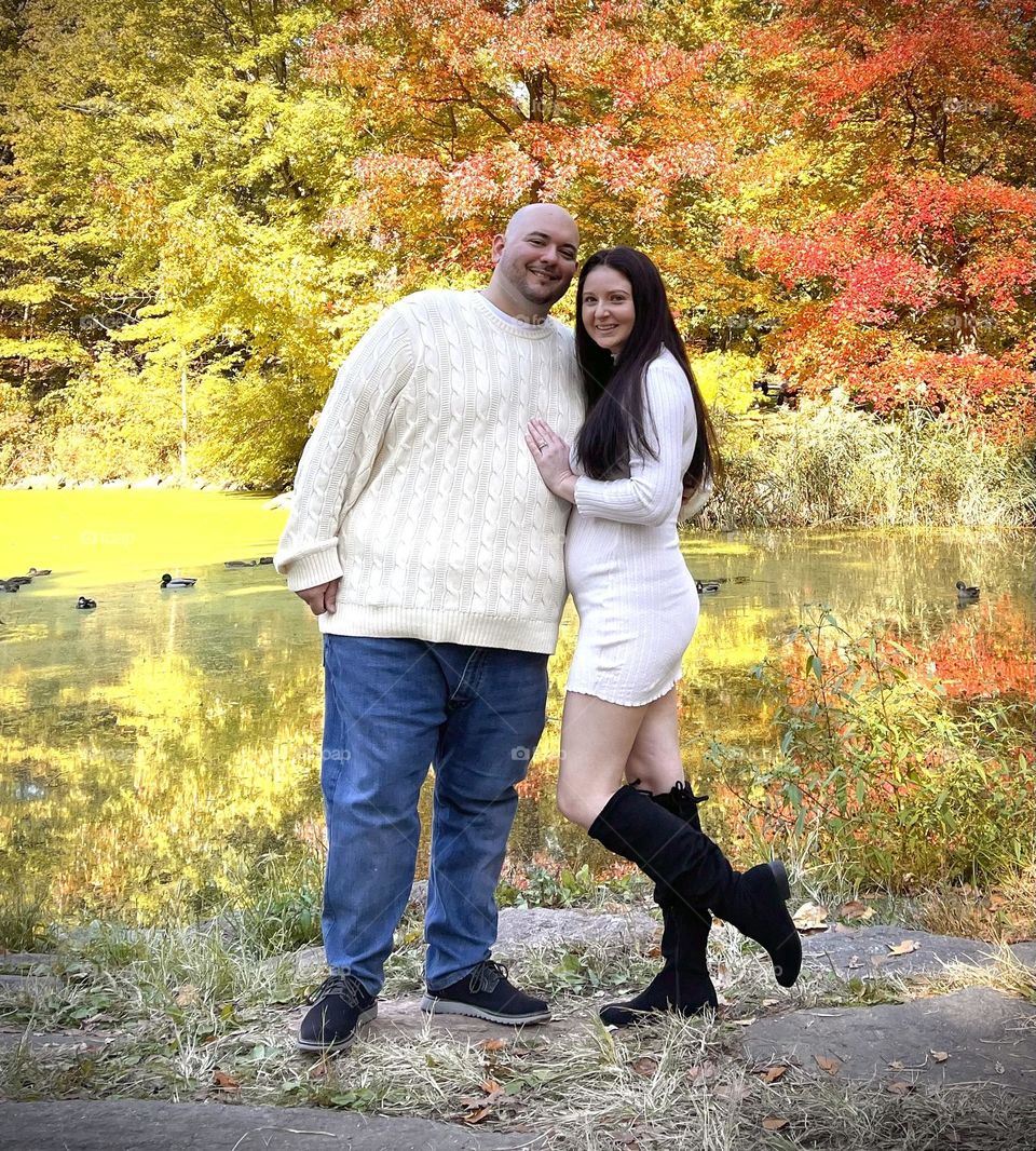 Stylish couple in Demi saison portrait shot surrounded by beautiful fall scenery