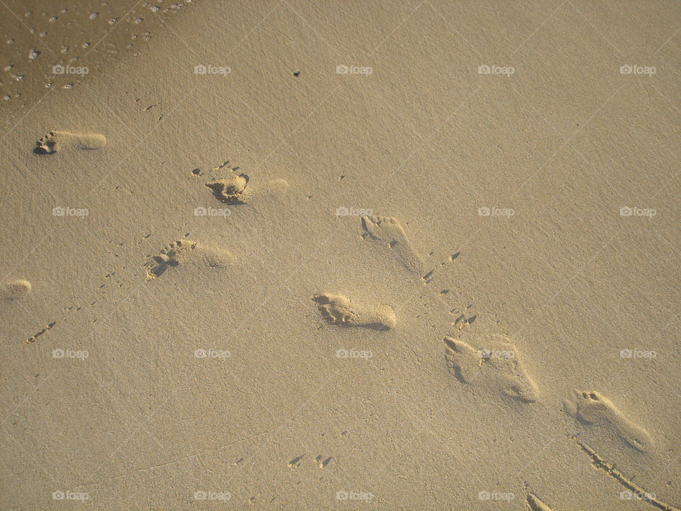 child sand footprints by rickie947