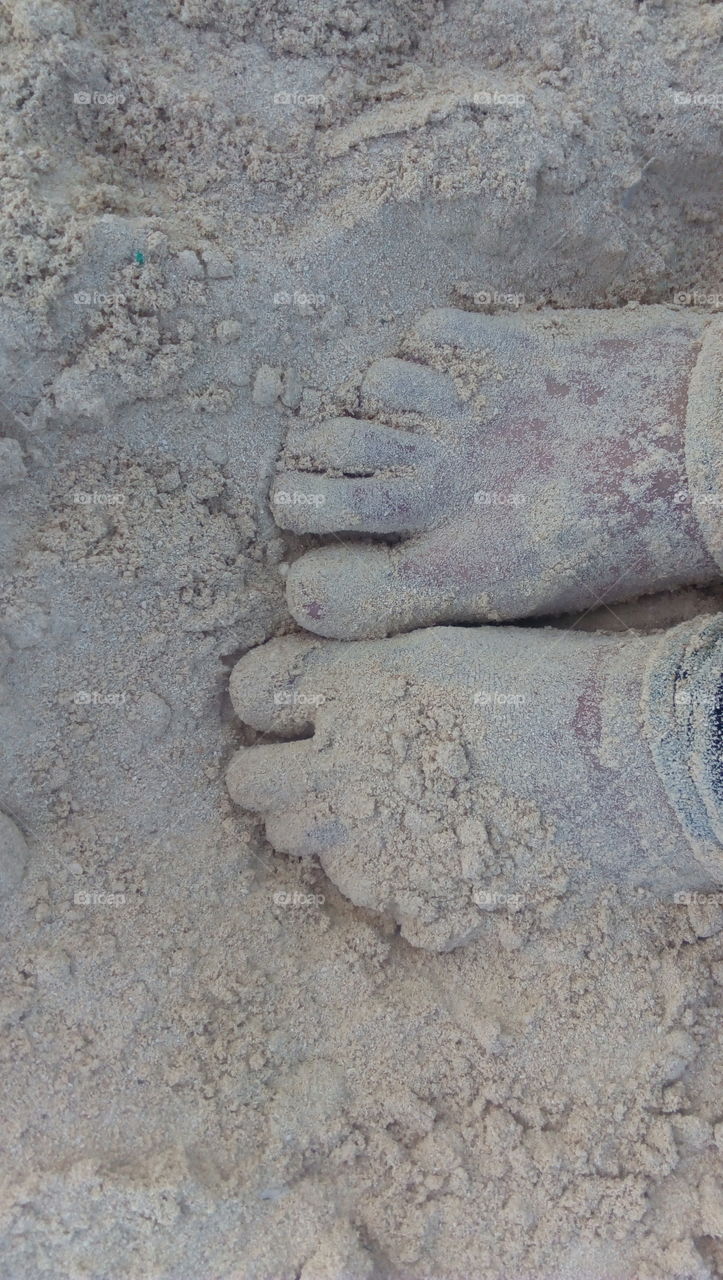 Feet in the sand