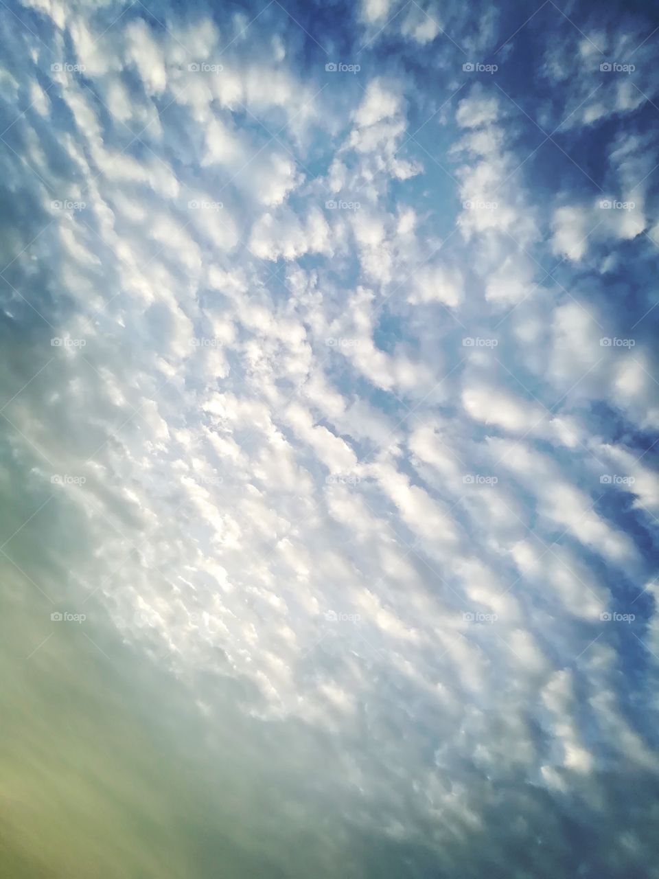 Look up at the sky. Today cloud is so beautiful.