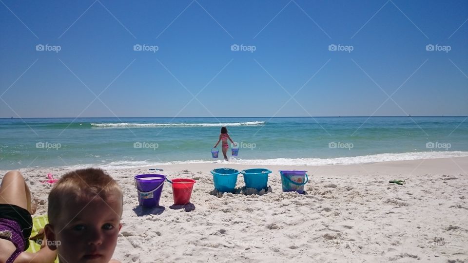 White sand and emerald waters.