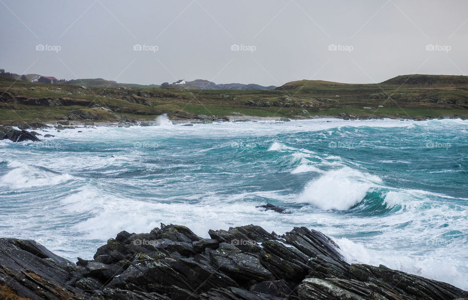 Scenic view of a sea against clear sky