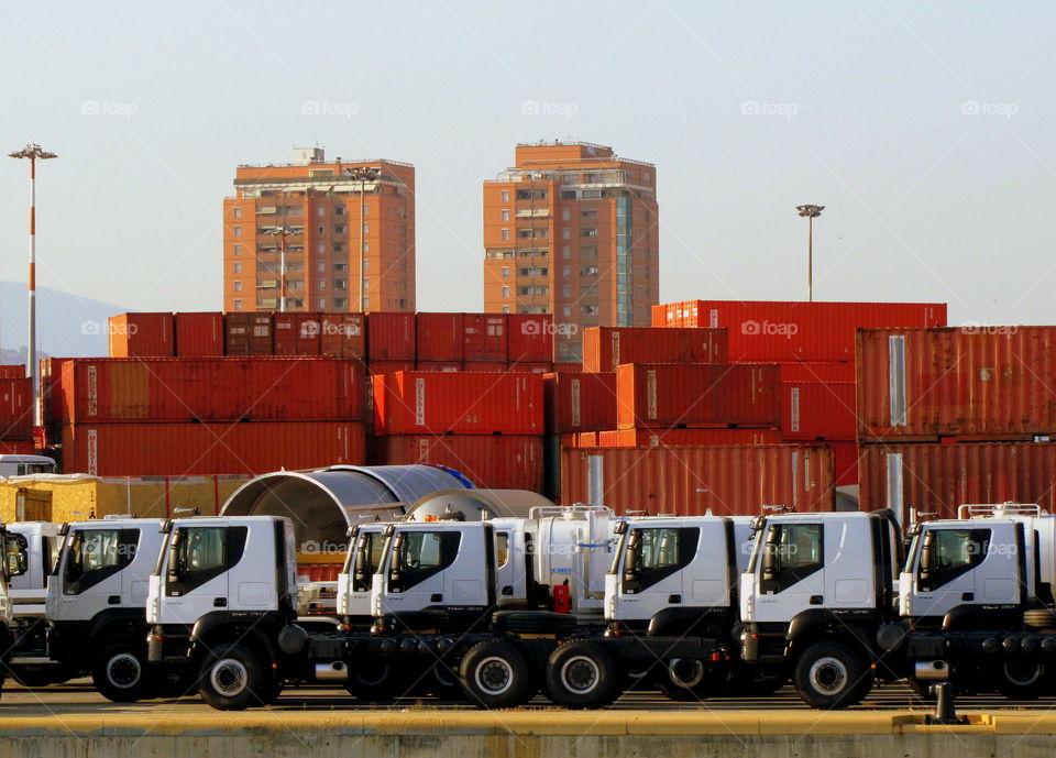 red container on the dock waiting forma cargo