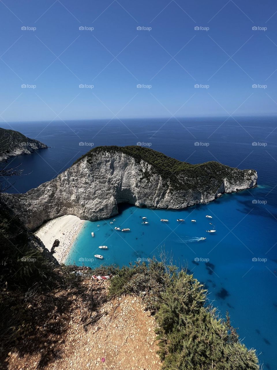 This is the viewpoint of Shipwreck Beach on the island Zakynthos in Greece. The ship stranded in 1980 and was abandoned by its crew. Allegedly it was used to smuggle cigarettes, but it’s a popular spot for tourists now. 