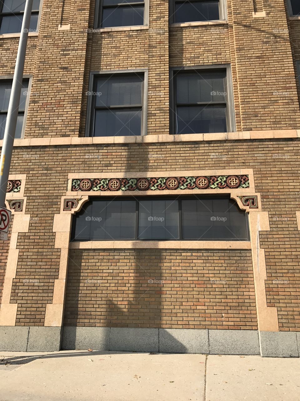 We are stopped at a light, in traffic. What a beautiful building!