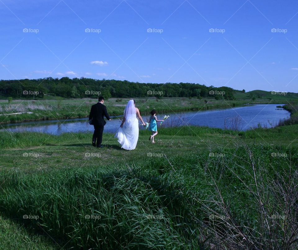 Field wedding. Bride groom in field