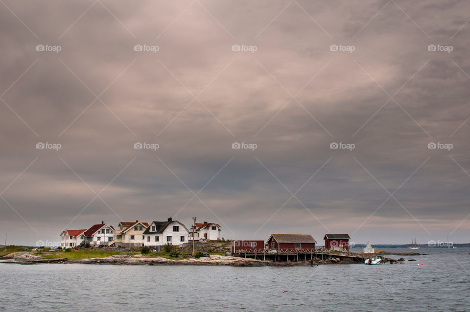 sweden grey clouds water by peo