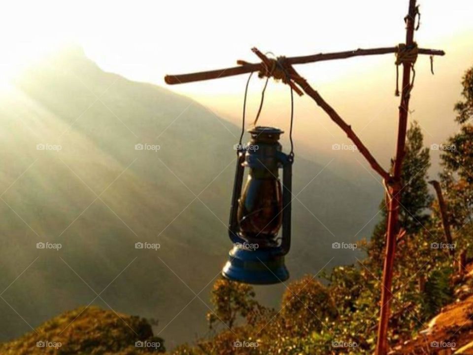 Beautiful view of lamp with sun rays