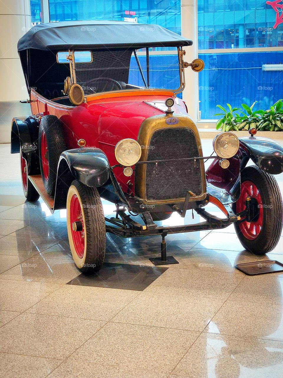 the color is red.  retro cars.  red "Fiat Valencia 505".