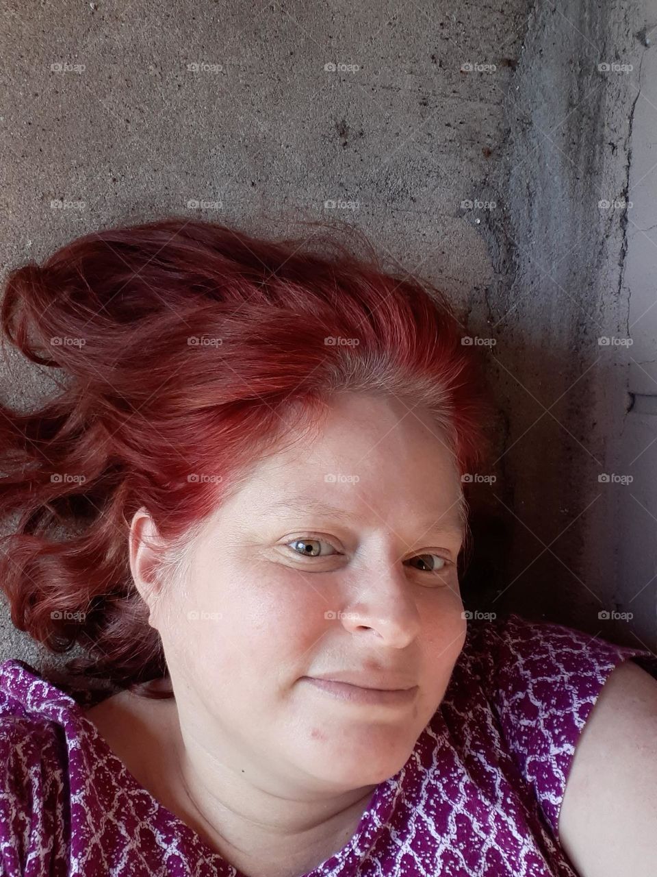I like to sit or lay down on my balcony and just get some fresh air. i took this selfie after recently coloring my hair.