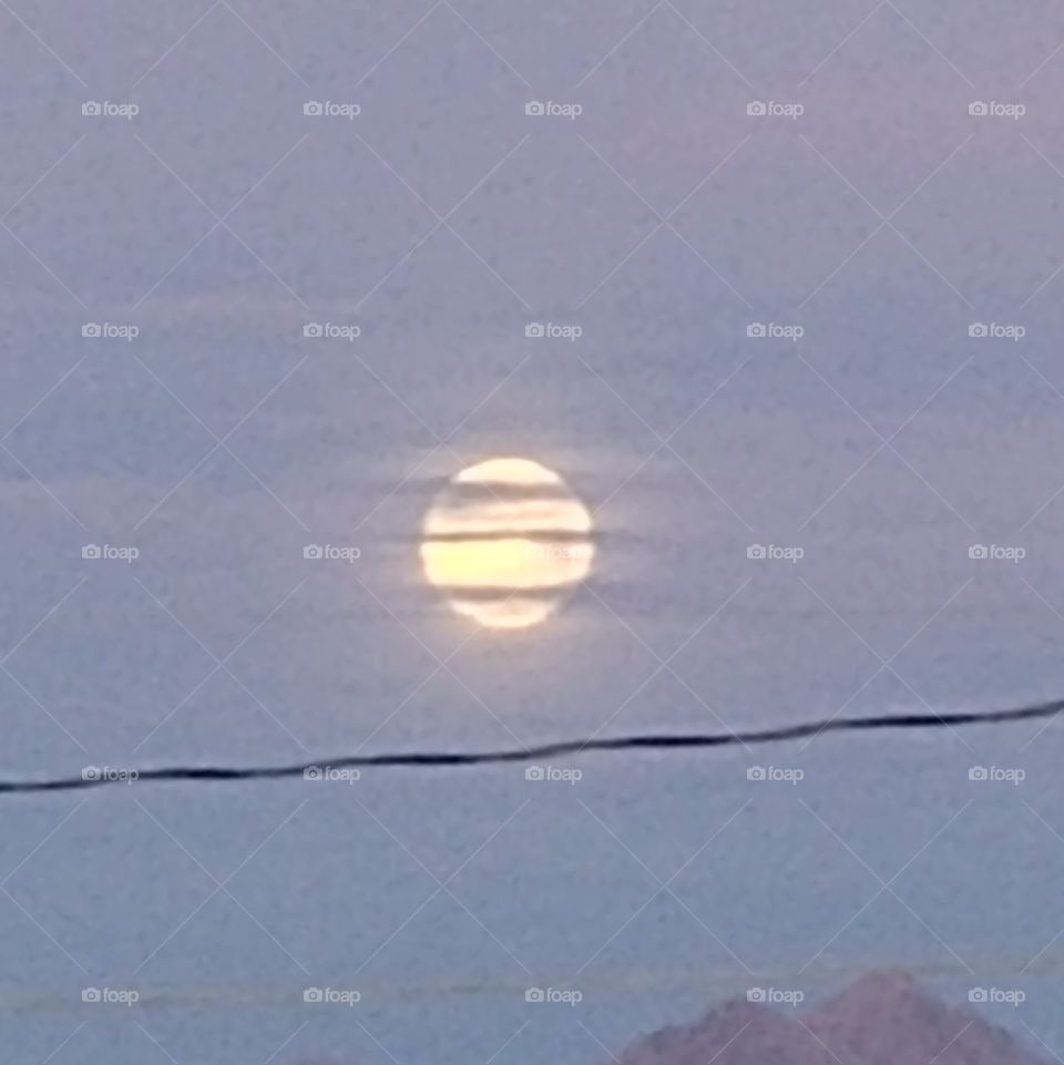 Arizona Moon in some cloud cover in the early am