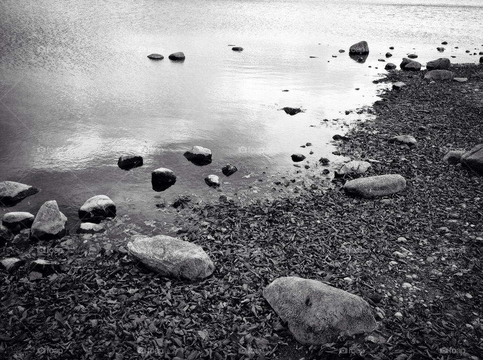 water lake stones rocks by lamorm1