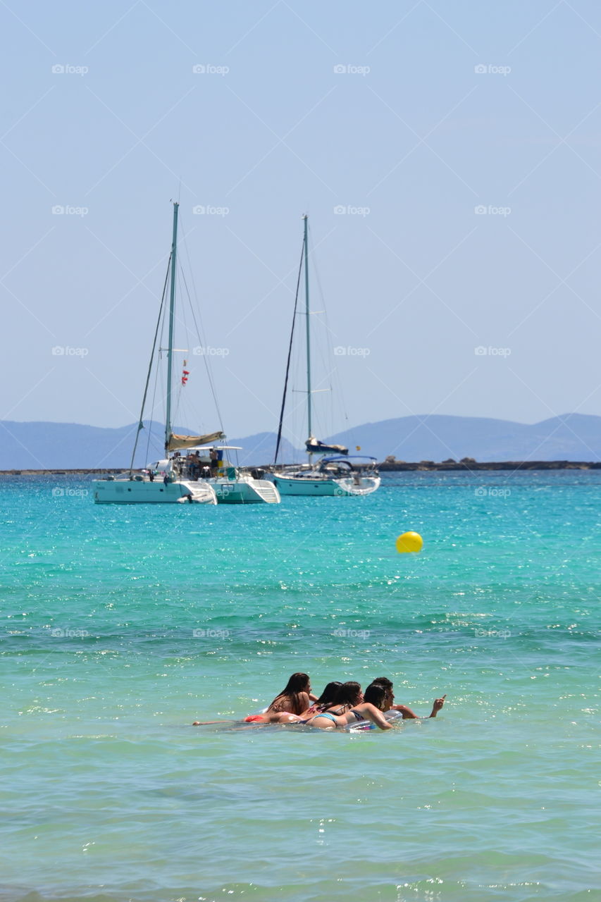 young people on the beach having fun