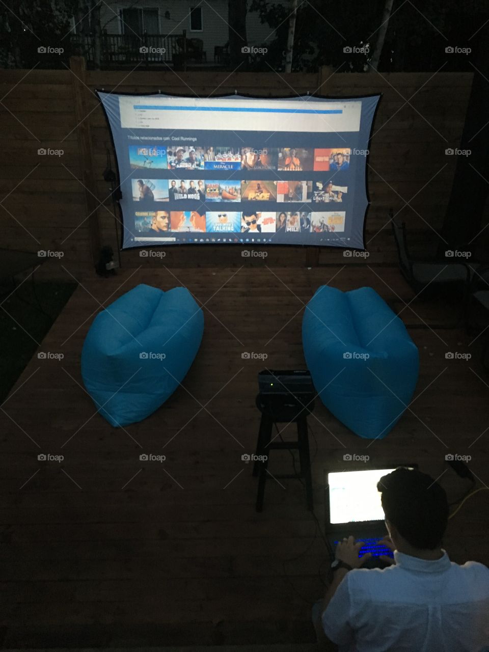 Awesome outdoor home cinema at night on projector