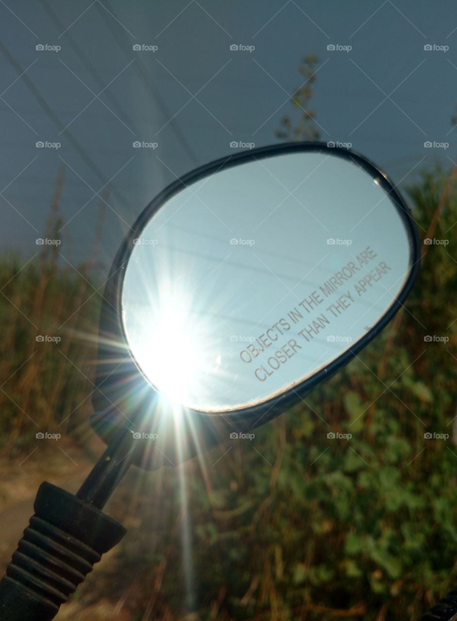 sun reflection in the mirror