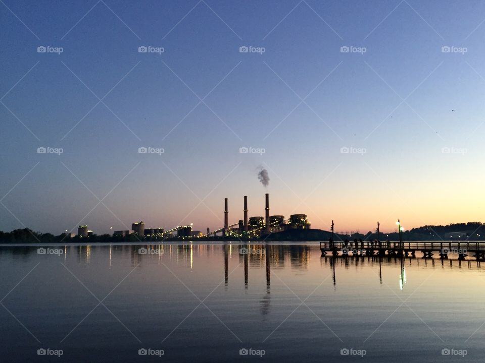 Lake sunset with power plant