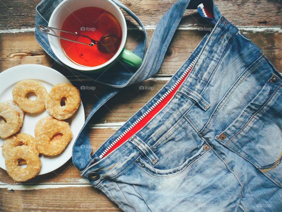 A cup of tea, homemade cakes and a denim bag