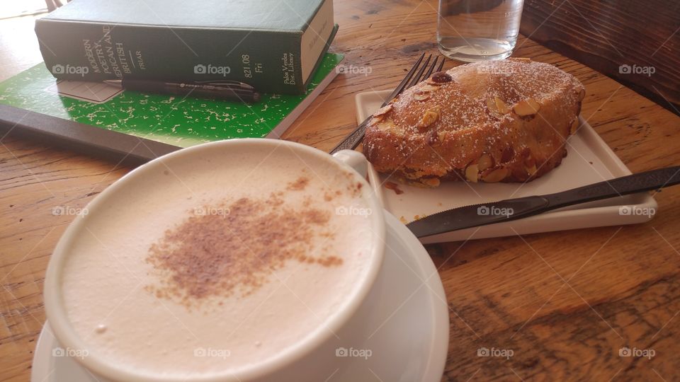 chai latte almond brioche and a good book to start the day