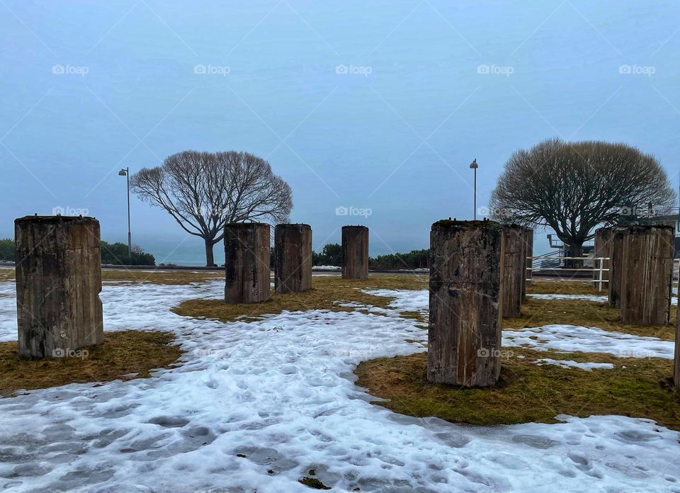 Odd concrete rectangles in front of the sea. They stand there as memorials for an old factory  used to stand there, Kallahti, Finland