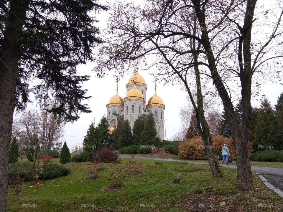 Beautiful church with golden yellow coverings which shines during day time