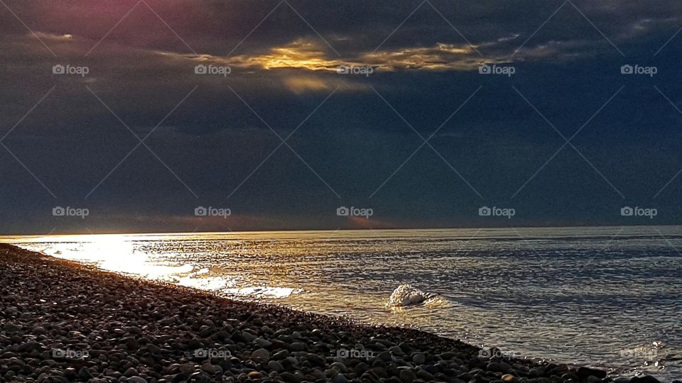 sunset before the storm at sea