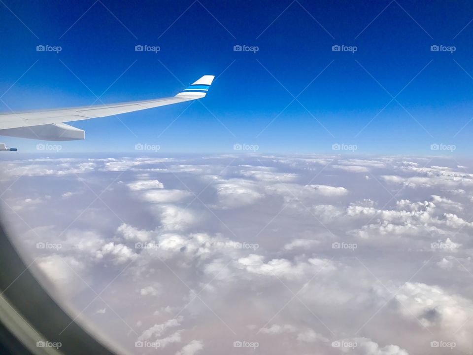 Amazing view of sky and clouds, aerial view from airplane 