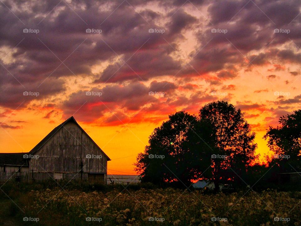 Beautiful old farm at sunset. 