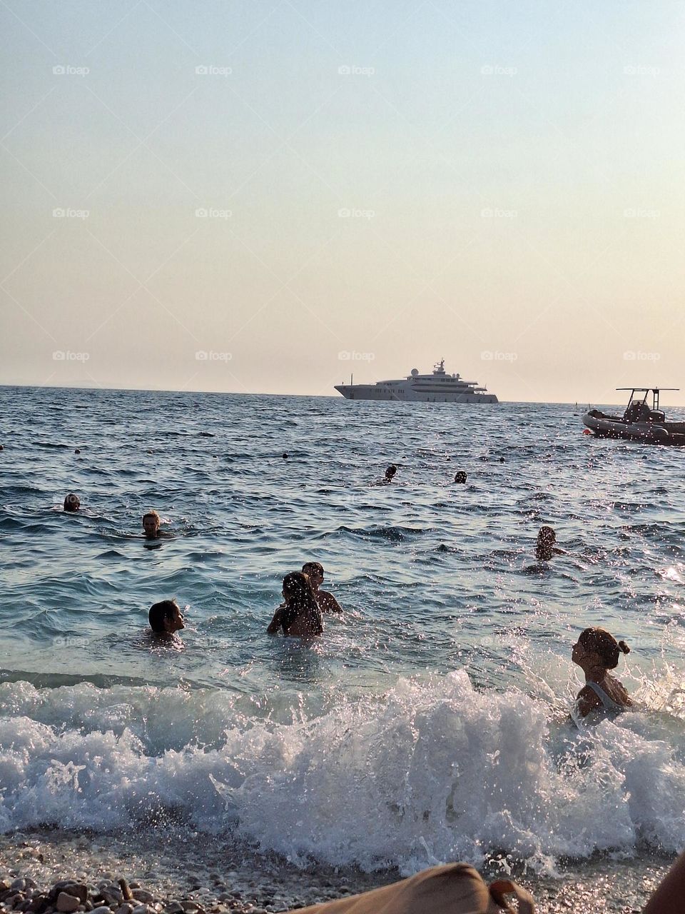 kids playing at the sea
