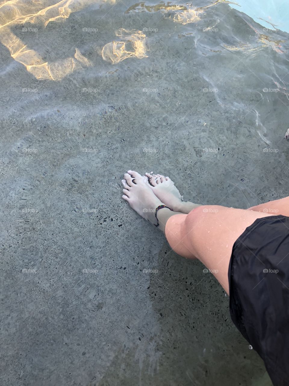 Feet in the water