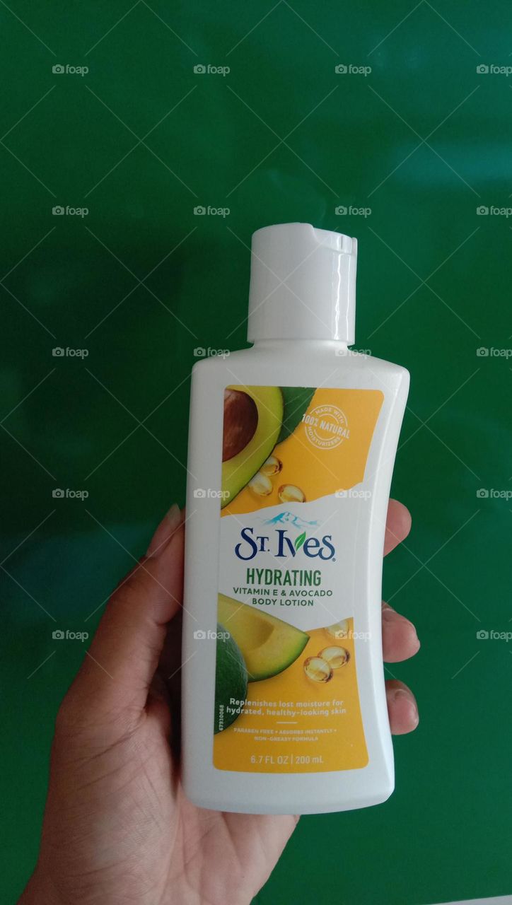 St Ives beauty products in hand