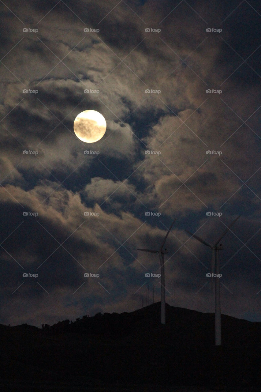 Moon over wind farm