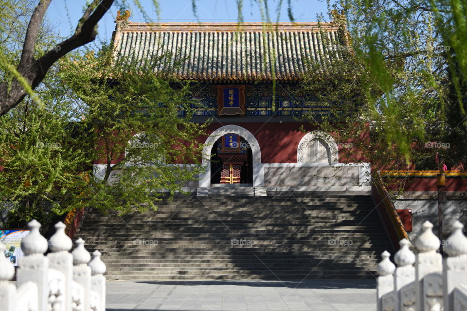 Asia China Beijing Houhai chinese temple in spring blue sky temple park chinese culture by a lake