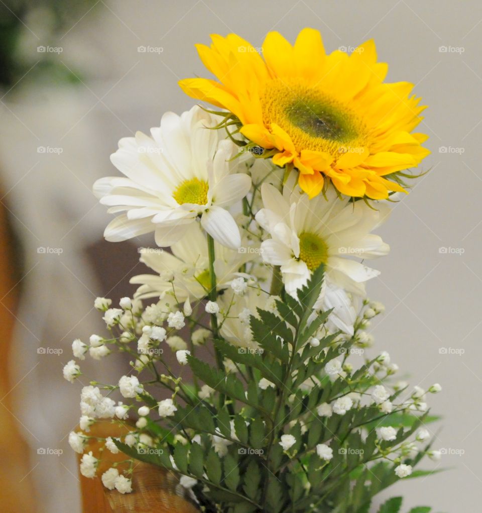 floral arrangement. yellow and white