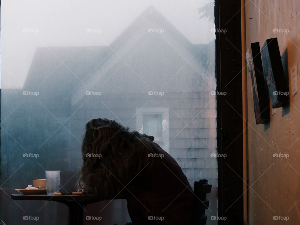 Foggy coffee shop windows.