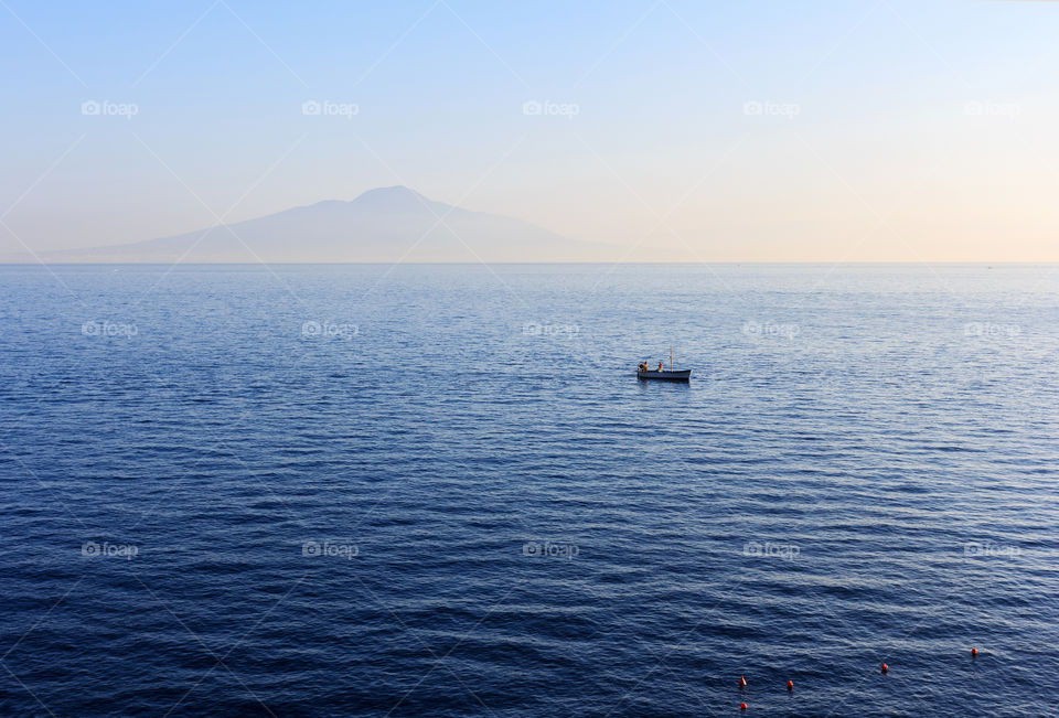 Distant view of boat in sea