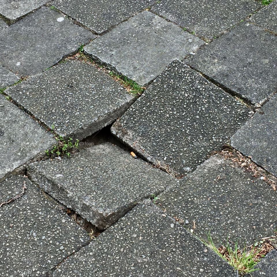 Elevated view of broken pavement