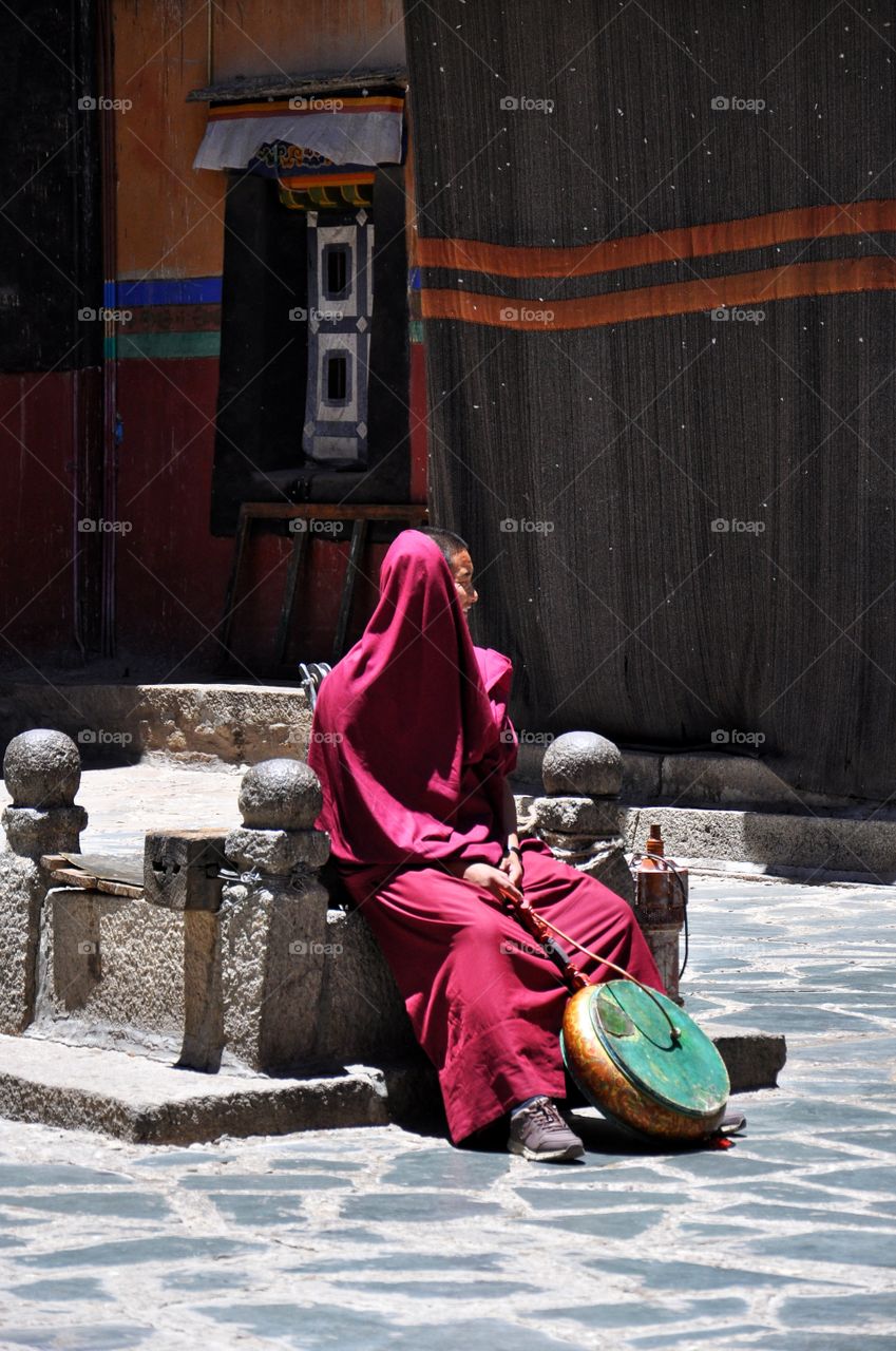 buddhist monk in sakya monastery in tibet