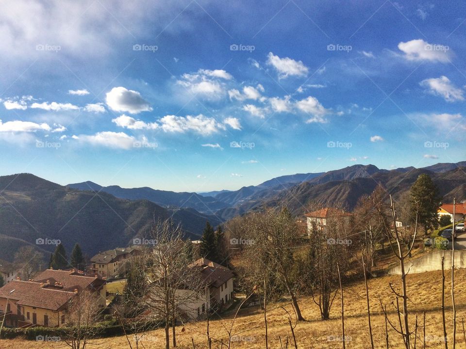 Panorama on alpine valley in winter time, without snow 