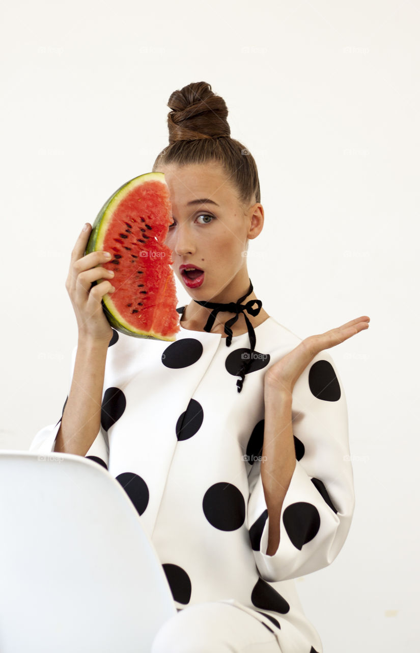 A woman with a watermelon 