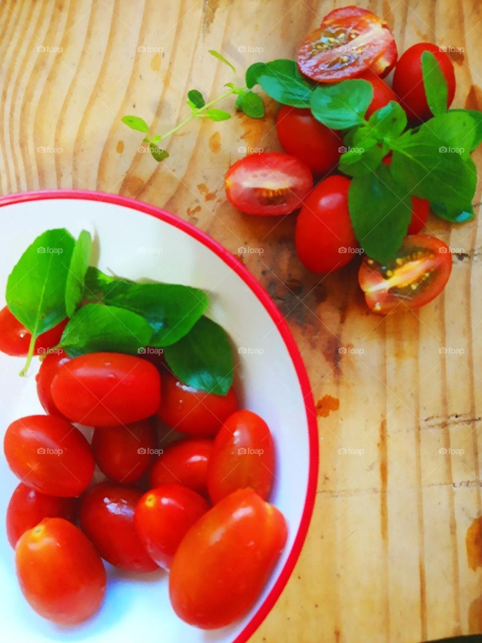 small tomato and Basil leaves
