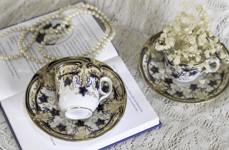 Victorian teacups with book & dried flowers