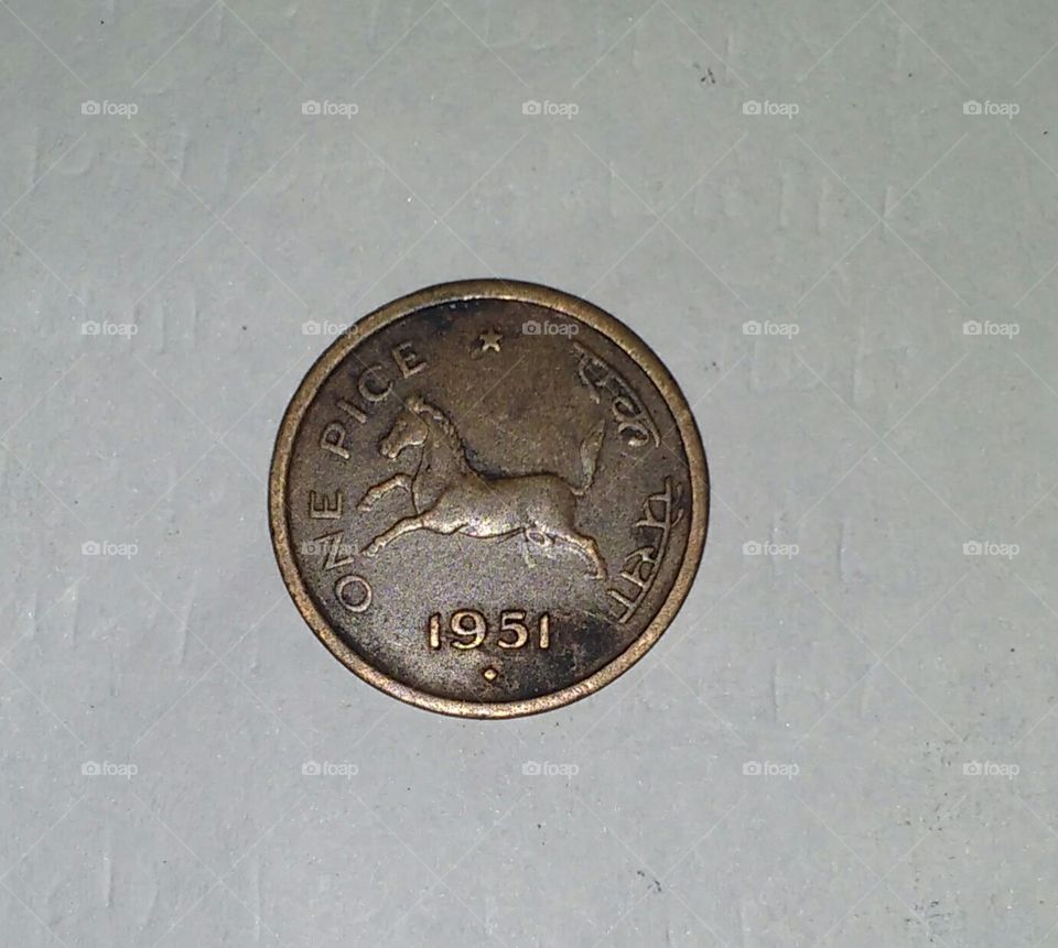 antique coin with horse symbol