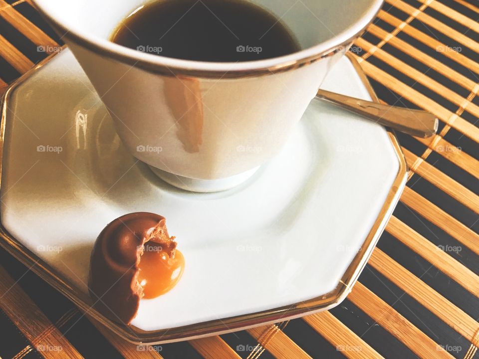 A cup of coffee with caramel chocolate