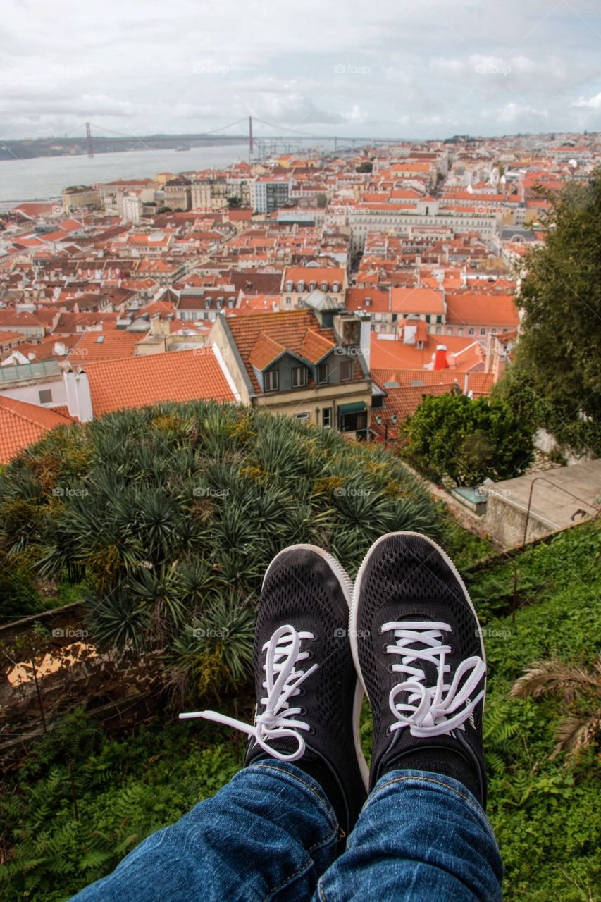 My feet and the 25 de Abril bridge