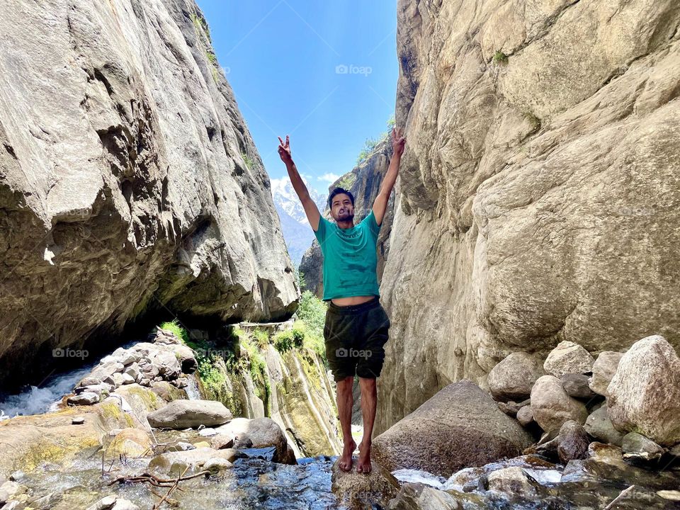 The power of adventure, hiking by waterfall