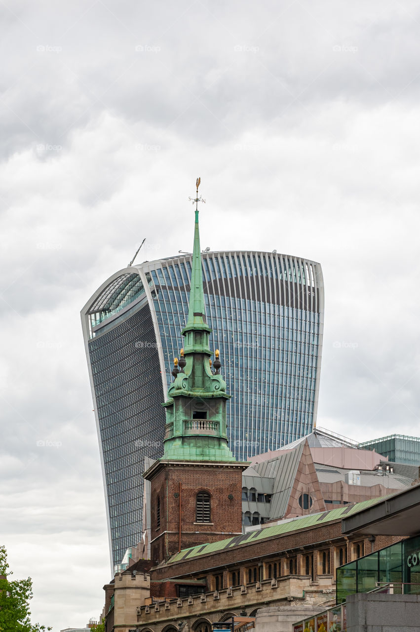 Walkie-talkie skyscraper, modern architecture versus old. London. UK.