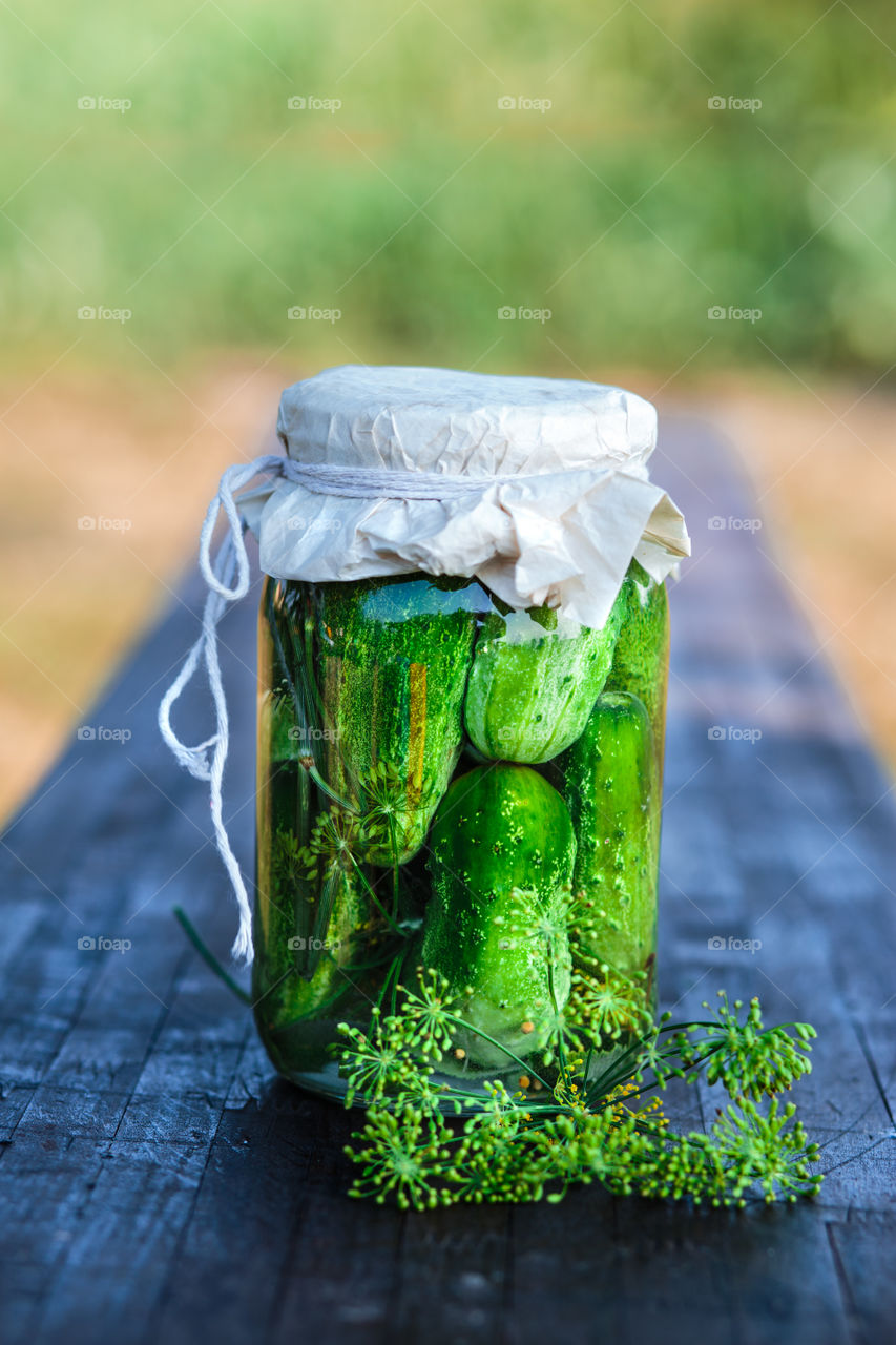 Pickled cucumbers. Pickled cucumbers made with home garden vegetables and herbs