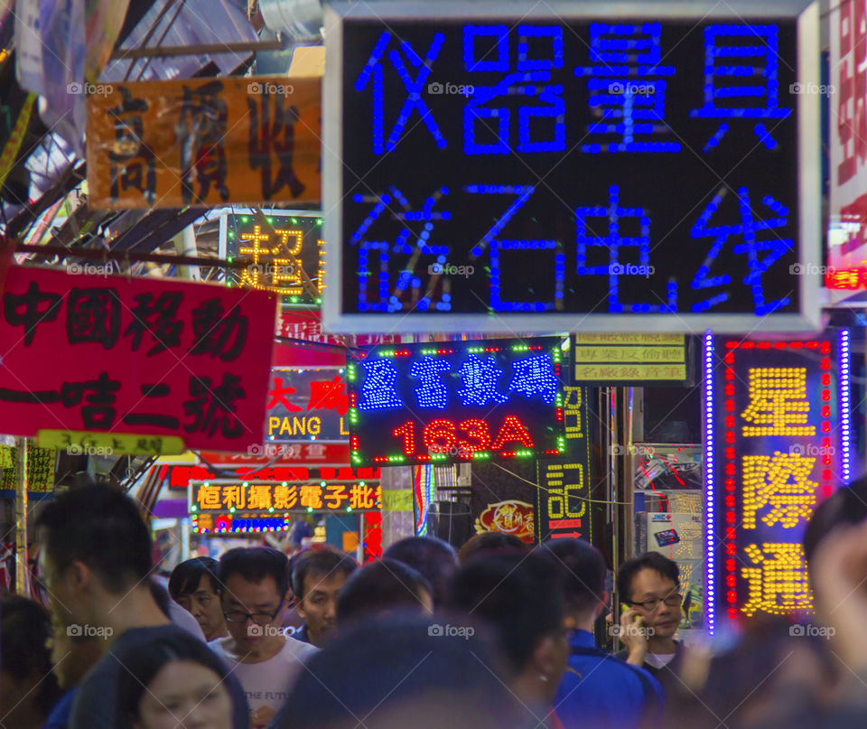 Walking through Causeway Bay. Hustle and bustle of Hong Kong shopping 