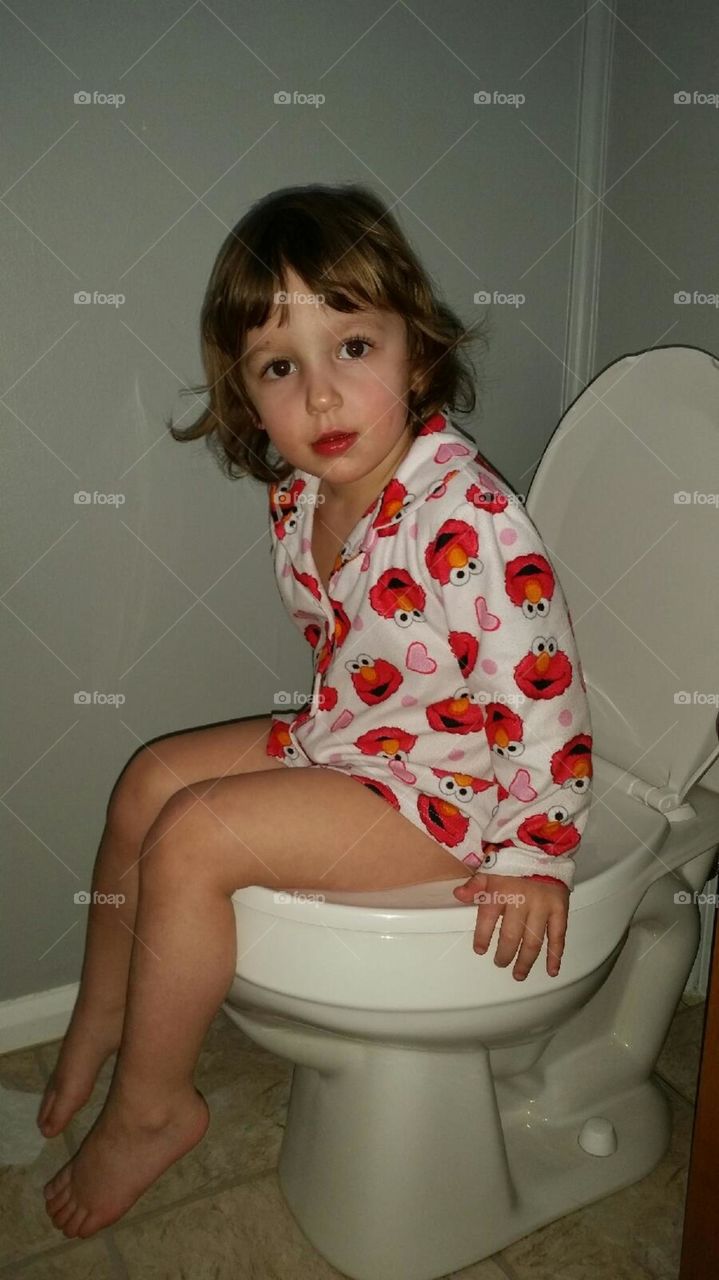 Concentration. Toddler learning potty training