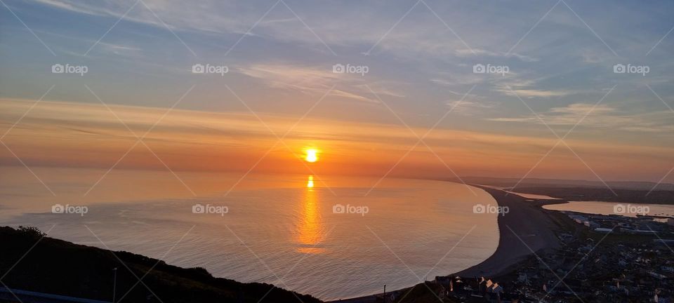 SUN SETTING ON PORTLAND UNITED KINGDOM